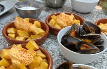 Seafood paella cooking class, tapas and visit to Ruzafa market.