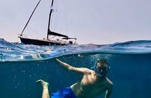 Sailing boat tour with lunch and swimming stops