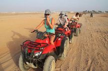 Ride into the Sunset Quad Biking Desert Safari Experience
