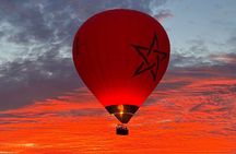 Hot air balloon flight in the desert with camel ride