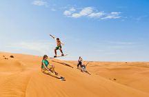 Private Evening Desert Safari with BBQ Dinner and Sand Boarding