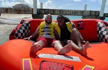 Tubing on grace bay beach Turks and caicos islands
