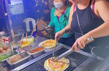 Private Street Food Discovery by Cyclo at Night in Ho Chi Minh