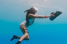 Snorkeling with underwater scooter in Taha’a lagoon from Raiatea