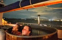 Luxury Northern Lights Yacht Cruise with Hot Tub & Dinner