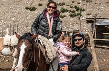 Horseback riding at sunset in the Andes
