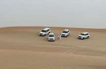 Abu Dhabi: 4-Hour Morning Safari with Camel Ride & Sand boarding