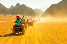 Ride into the Sunset Quad Biking Desert Safari Experience