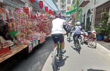 Half Day Back Alleys Expedition in Saigon by Bike