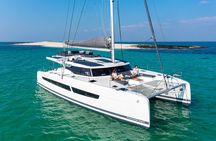 Semi-Private Brand-New Catamaran Cruise in Mykonos with Meal, Drinks & Transport
