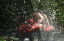ATV Quad Bike Through Tunnel and Waterfall