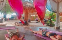 Sunrise yoga class overlooking the beach, the sea & sunrise .