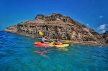 Kayak around the Mogan Caves and Cliffs