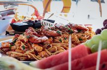 Catamaran Cruise to Dia Island with Meal and Water Activities