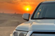 Private Morning Safari Camel Ride, Dune Bashing and Sandboarding