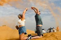 4 Hours Desert Safari Dune Bashing Camel Ride and Sand Boarding