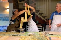 Traditional pasta rolling in an ancient Tuscan home