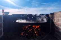 Traditional Valencian paella, cooked with orange wood.