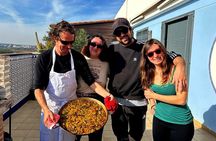 Traditional Valencian paella, cooked with orange wood.