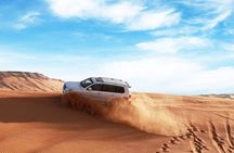Dubai Red Dune Safari with Camel Ride, Sandboarding & BBQ Dinner