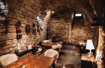 Immersive cellar tour, tasting and board meal