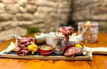 Immersive cellar tour, tasting and board meal
