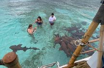 Private Tiki Boat Adventure in Caye Caulker