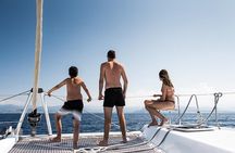 Luxury Santorini Catamaran Cruise: Lunch, BBQ, Drinks, Transfers