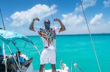 Deluxe Catamaran to Isla Mujeres, with Drinks, Snorkel & Buffet