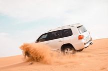 Arabian Desert safari + Quad Bike + Camel Ride + Sandboarding 