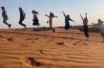 Arabian Desert safari + Quad Bike + Camel Ride + Sandboarding 
