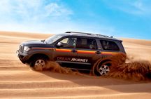 Dubai Desert Discovery: Red Dunes Safari, Sandboard & Camel Ride
