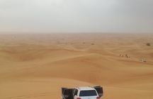 Explore Dubai: Quad bike, Buggy, Camel Riding, and Sand Boarding