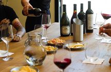 Argentine Wine Tasting in Caminito with Appetizers Included