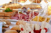 Catamaran sailing at sunset with tapas Palma de Mallorca