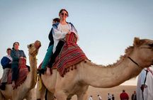 Private Sunrise Desert Safari with Camel Ride and Sand Boarding 