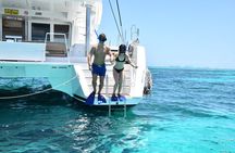 Cancun to Isla Mujeres Catamaran with Snorkel and Beach Club