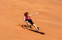Desert Safari Dubai with BBQ Dinner, Sand Boarding & Camel Ride 