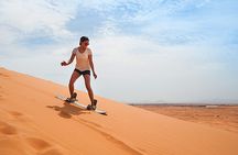  Desert Safari BBQ dinner, Camel ride & sandboarding from Dubai