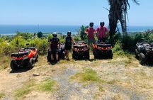 Guided ATV Tour on Mountain Dirt Road with Views of Roatan