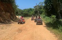 Guided ATV Tour on Mountain Dirt Road with Views of Roatan