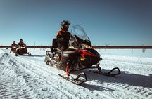 Snowmobile Safari with Ice Fishing and Outdoor Lunch in Levi