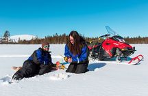 Snowmobile Safari with Ice Fishing and Outdoor Lunch in Levi