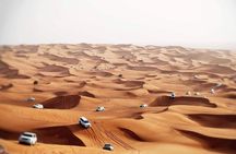 Arabian Desert safari + Quad Bike + Camel Ride + Sandboarding 