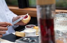 London Afternoon Tea Experience Aboard a Glass-Roofed Bus