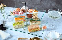 London Afternoon Tea Experience Aboard a Glass-Roofed Bus