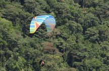 PARAGLIDING OVER GUACAICA JUNGLE AND CANYONING from Guatape