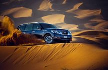 Desert Safari with BBQ Dinner, Camel Ride, Sand Board & Live Show
