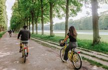 Versailles Domain Bike Tour with Palace Entry by Train from Paris