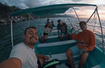 Bioluminescence & sunset boat tour to Los Arcos Sanctuary